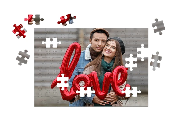 Puzzle mit persönlichem Motiv erhöht den Spaßfaktor Fotoprodukte: Fotopuzzle mit Paarmotiv und rotem Love-Schriftzug