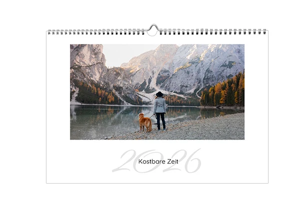 Fotoprodukte Fotokalender – persönlicher Kalender mit eigenen Fotos Fotoprodukte Fotokalender mit Monatsübersicht und persönlichem Foto eines Paares im Winter, individuell gestaltet für das ganze Jahr.