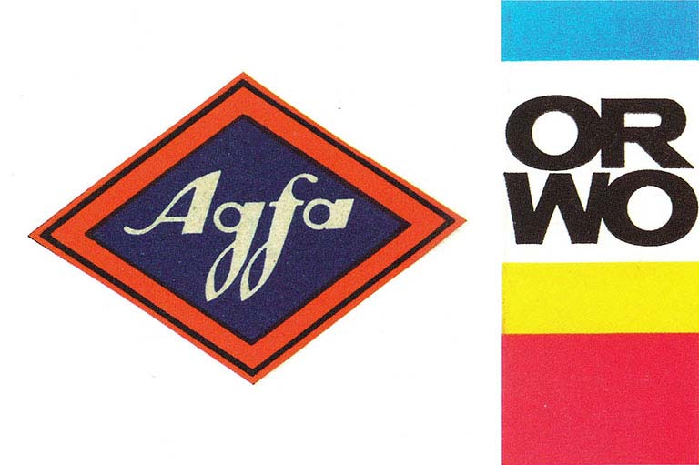 ORWO Historie – AGFA wird zu ORWO (Original Wolfen) Das Bild zeigt die beiden Logos: AGFA und ORWO (Original Wolfen). AGFA, ein Pionier der Fototechnologie, wurde später zu ORWO, einer Marke, die eine bedeutende Rolle in der Entwicklung der Fotografie und Filmentwicklung spielte.